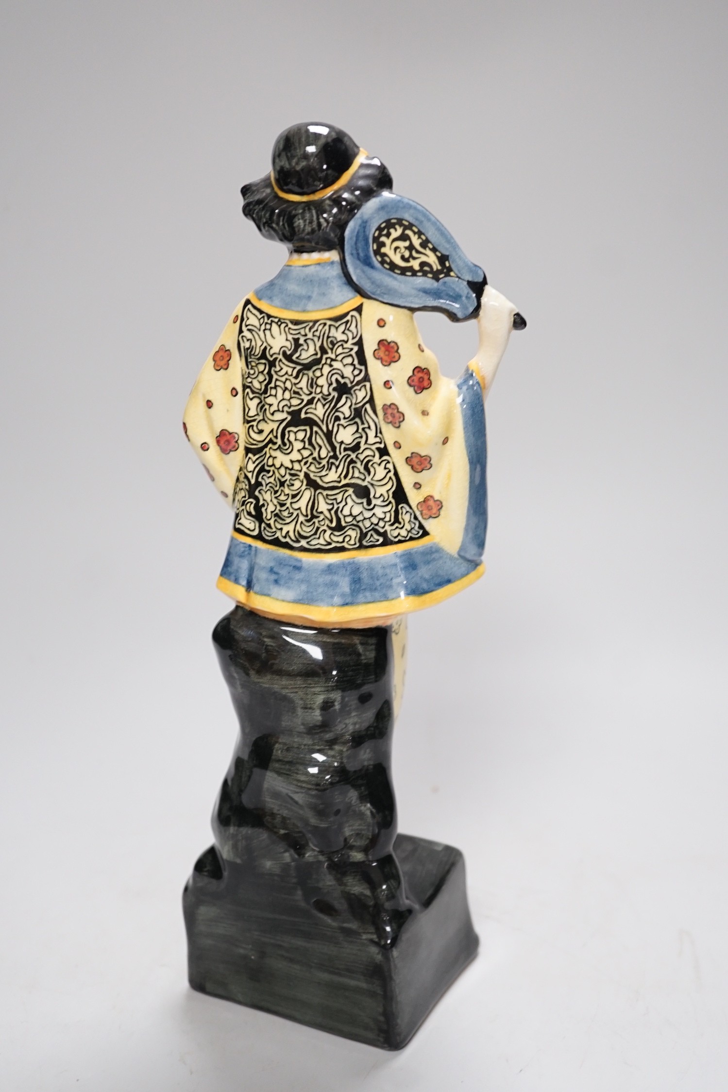 A Royal Doulton advertising figure 'Grossmith’s Tsang Ihang perfume of Tibet', 30cm high